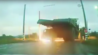 Watch This Giant Dump Truck Fart Out An Actual Fireball